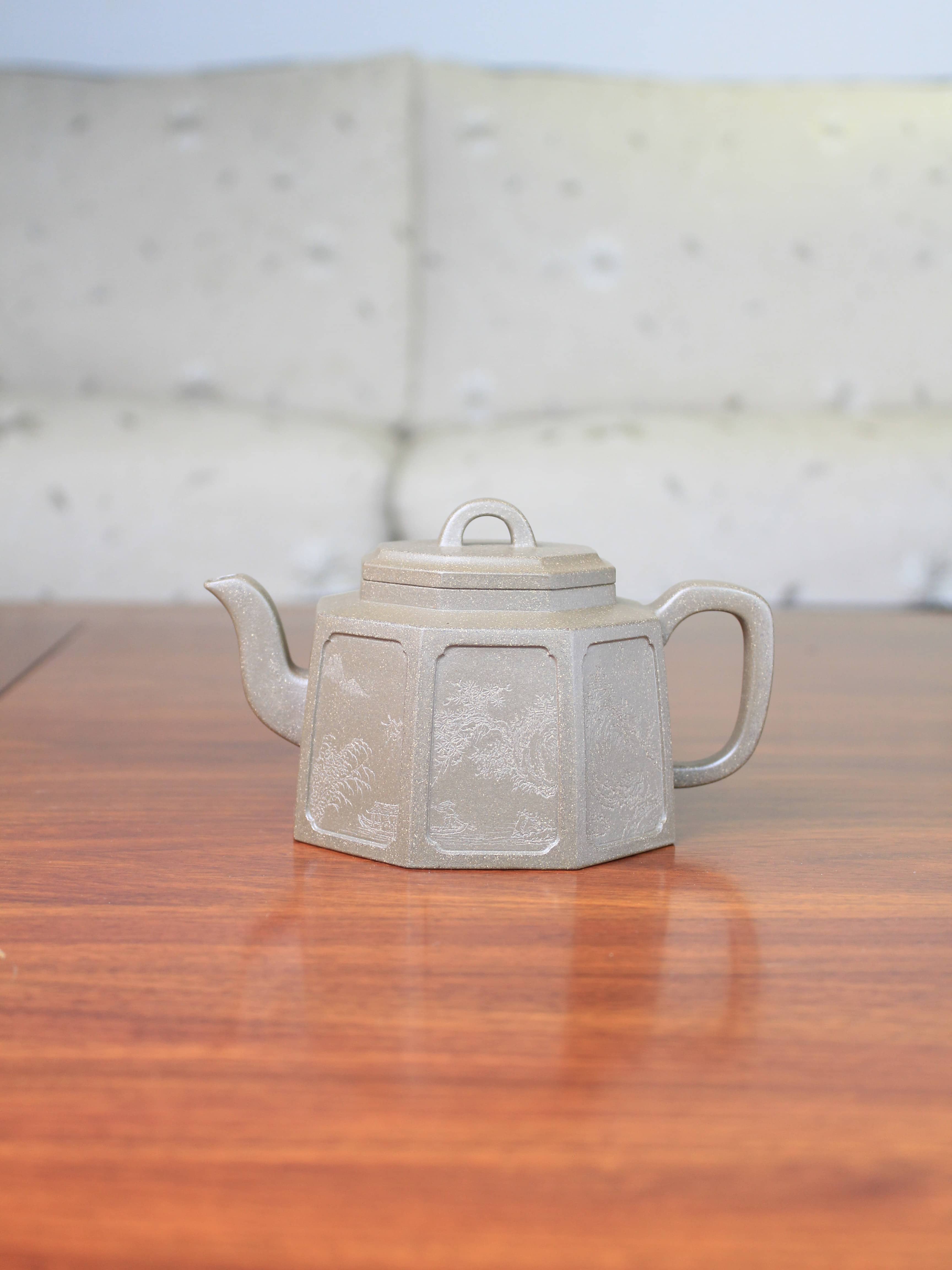Collectible teapot named ba fang on the table